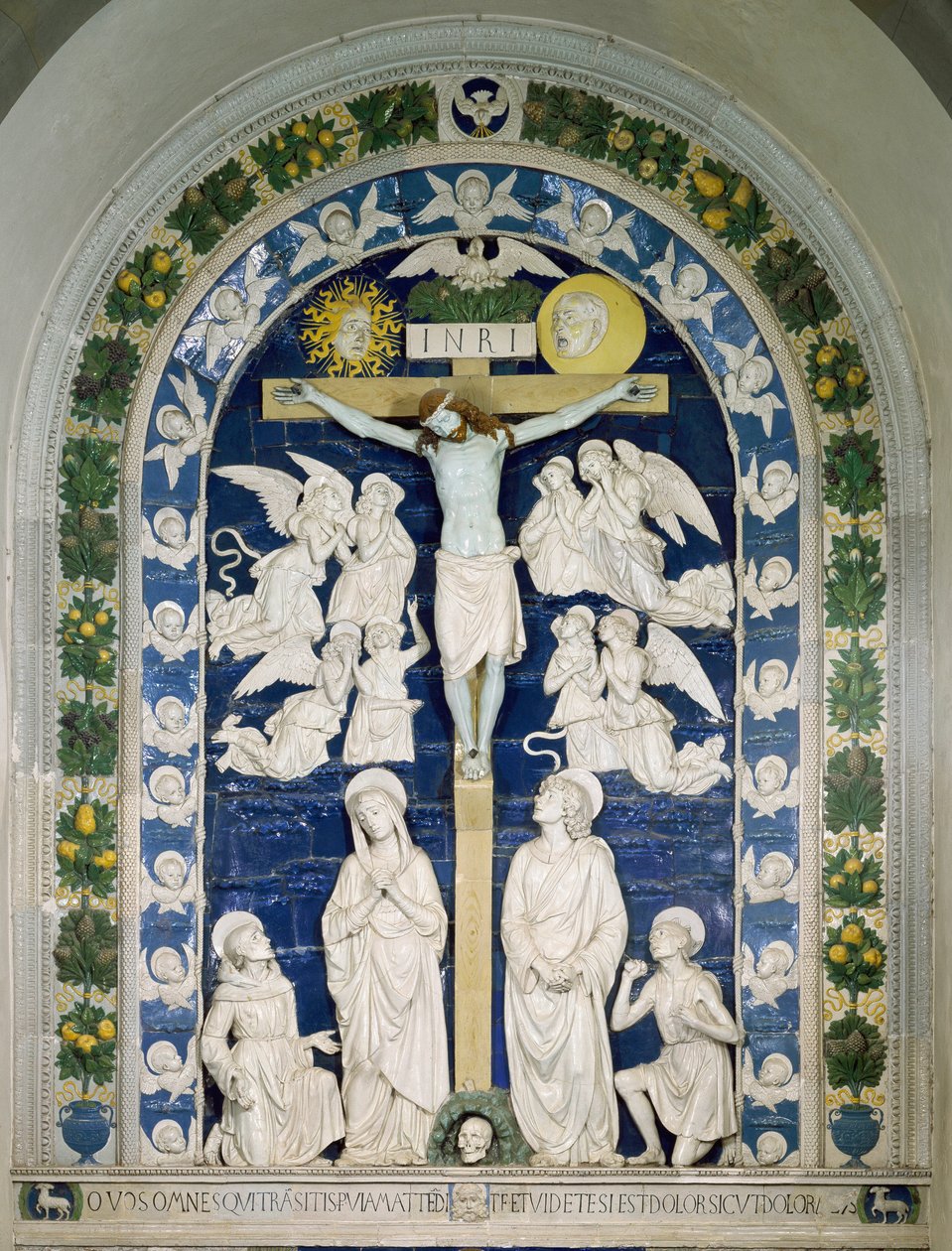 The Crucifixion with Saint Francis of Assisi, Saint John Evangelist, and Saint Jerome Inscribed INRI on the Cross. High Relief Ceramic by Andrea della Robbia around 1481. Santuario della Verna, Italy by Andrea Della Robbia