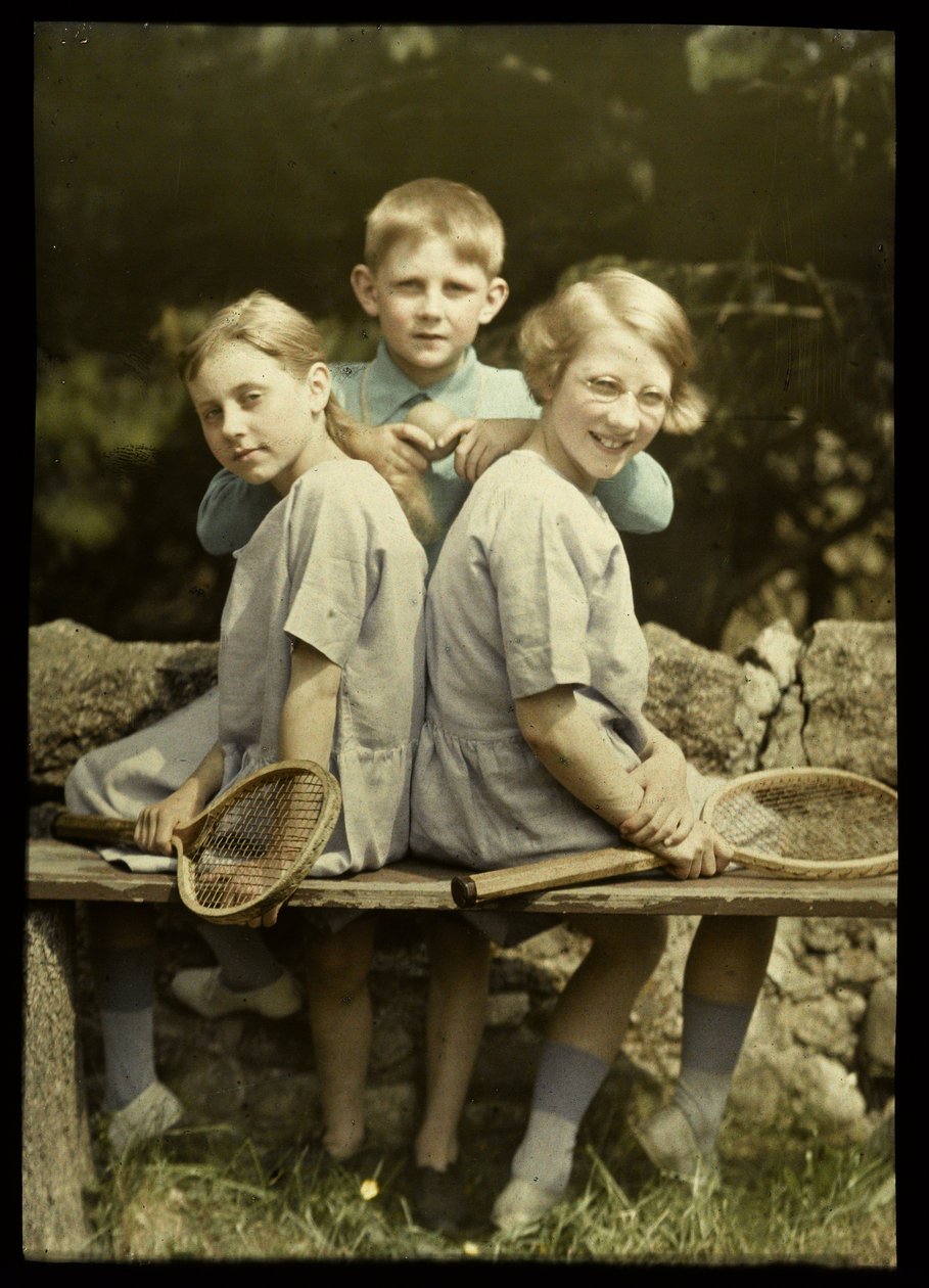 Portrait of Two Girls with Tennis Rackets and a Boy with a Tennis Ball by Anonymous