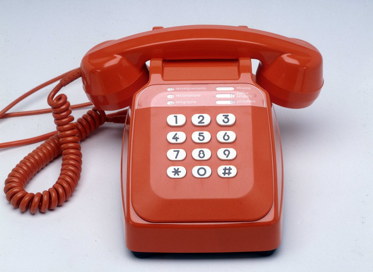 S63 Orange Plastic Key Phone by Anonymous Anonymous