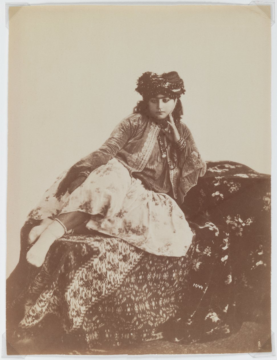 Reclining woman with a turban by Antoin Sevruguin