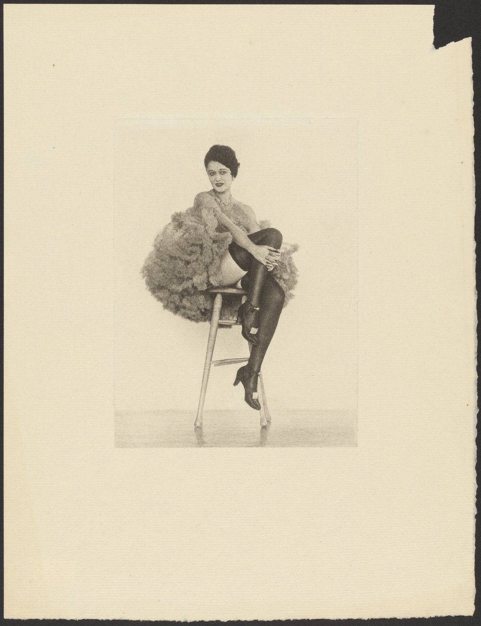 Woman in Can Can Costume Seated on Stool by Arthur F. Kales