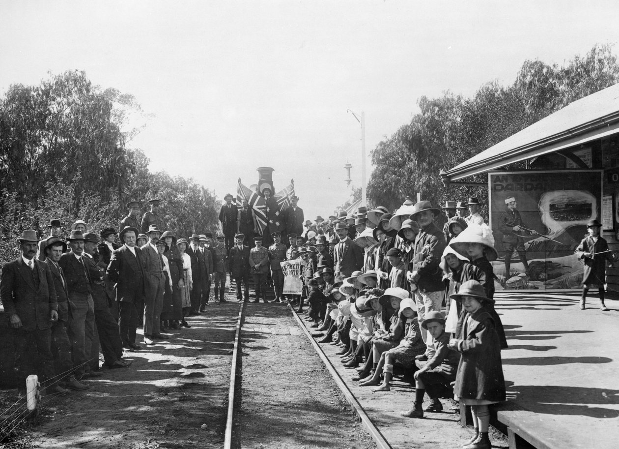A touring recruiting train at the railway station with some of the towns citizens, Wallumbilla, Queensland, c.1916 by Australian Photographer