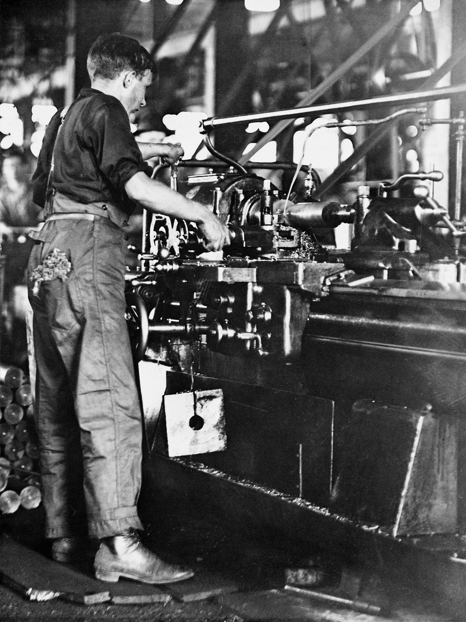 A tradesman making shell casings at a Walsh Island mill, Newcastle, New South Wales, c.1916 by Australian Photographer