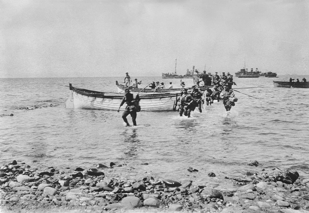 Australian Soldiers Wading Through the Water as They Come Ashore at Anzac Cove, Gallipoli on 25 April 1915 After Being Transported in Landing Boats from Larger Ships in the Background, 25 April 1915 by Australian Photographer