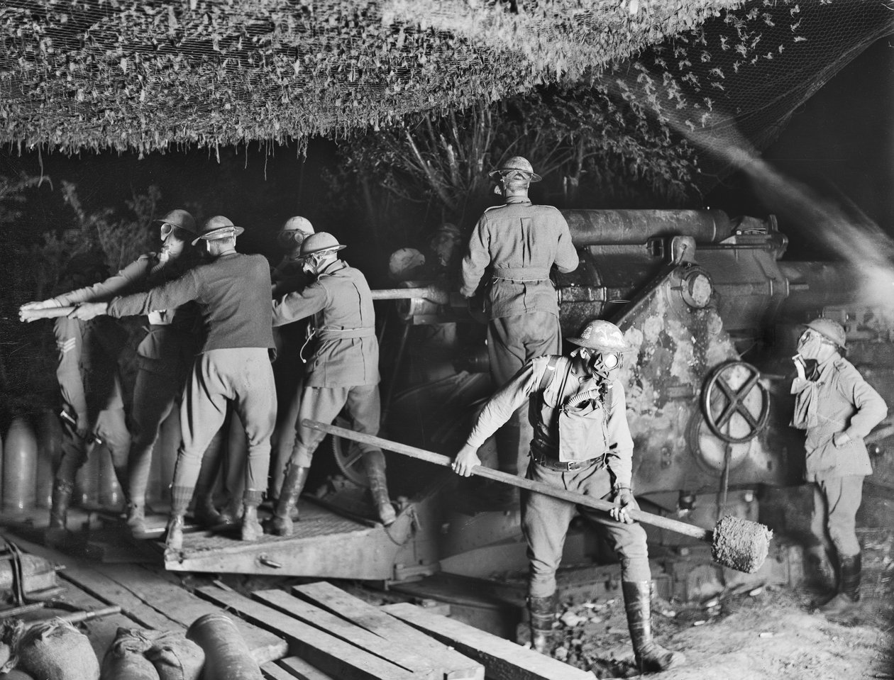The 2nd Australian Siege Battery Working on a 9.2 Inch Howitzer in Their Gas Masks During an Attack at Voormezeele, 15 September 1917 by Australian Photographer