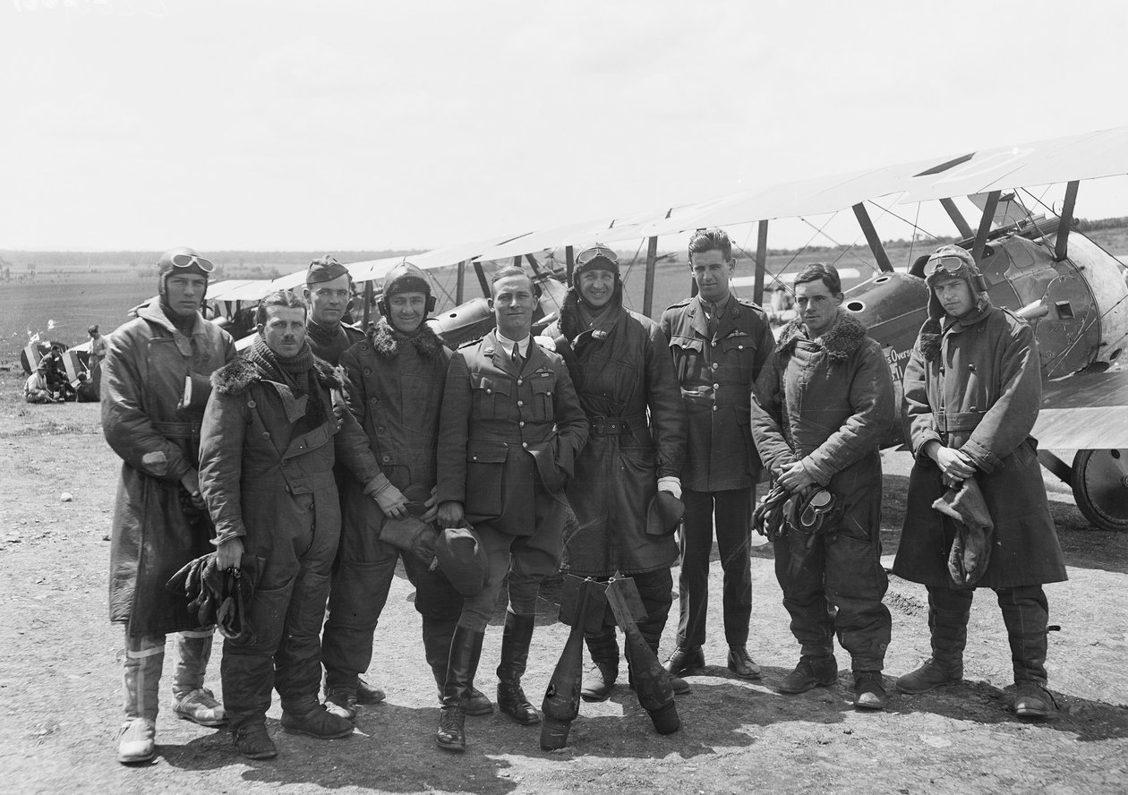 The officers of A Flight, No. 4 Squadron, Australian Flying Corps, in full flying gear in front of line up of Sopwith Camel aircraft, 16 June 1918 by Australian Photographer