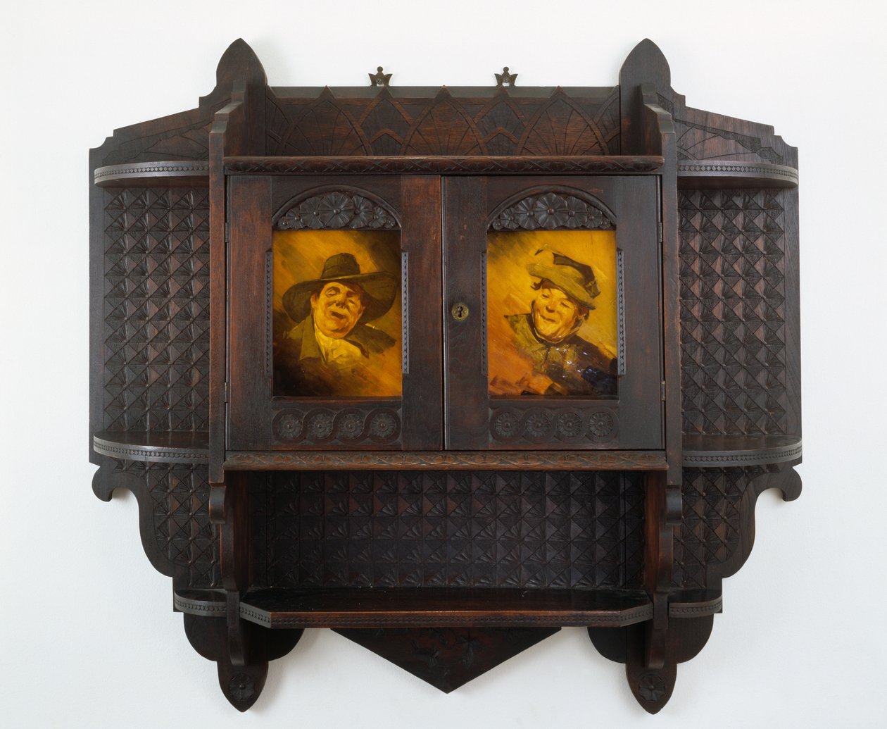 Hanging Wall Cabinet with Ceramic plaques, carving attributed to Mary Madeline Nourse, plaques to Artus van Briggle (1869-1904) 1887-99 by Benn attr.to Pitman