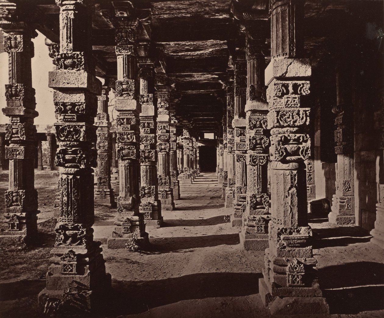 Interior of the Colonnade of Hindu Pillars at the Qutub by Bourne and Shepherd