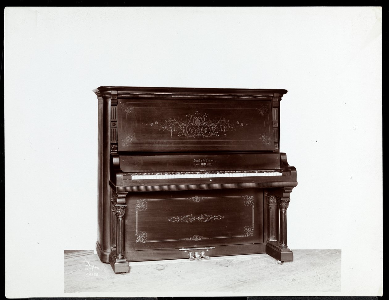 A piano by Newby and Evans Piano Co., 1907 by Byron Company