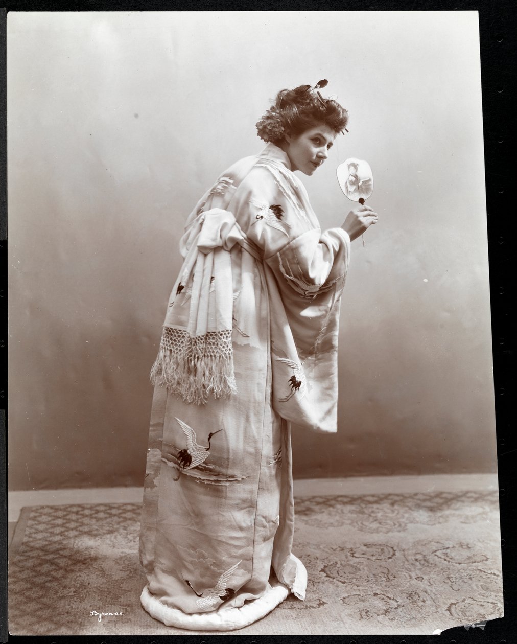 A woman modeling a Japanese kimono, New York by Byron Company