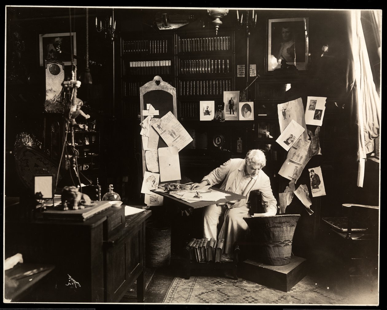 David Belasco seated in his study in New York, 1909 by Byron Company