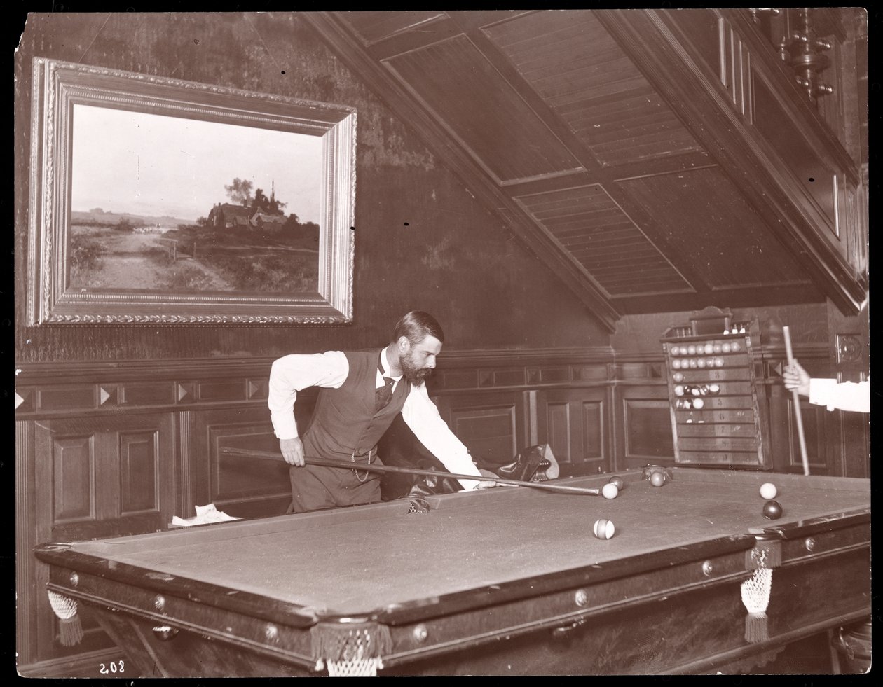 Edwin Gould playing pool at his home in Rhinecliffe, New York, 1893-4 by Byron Company