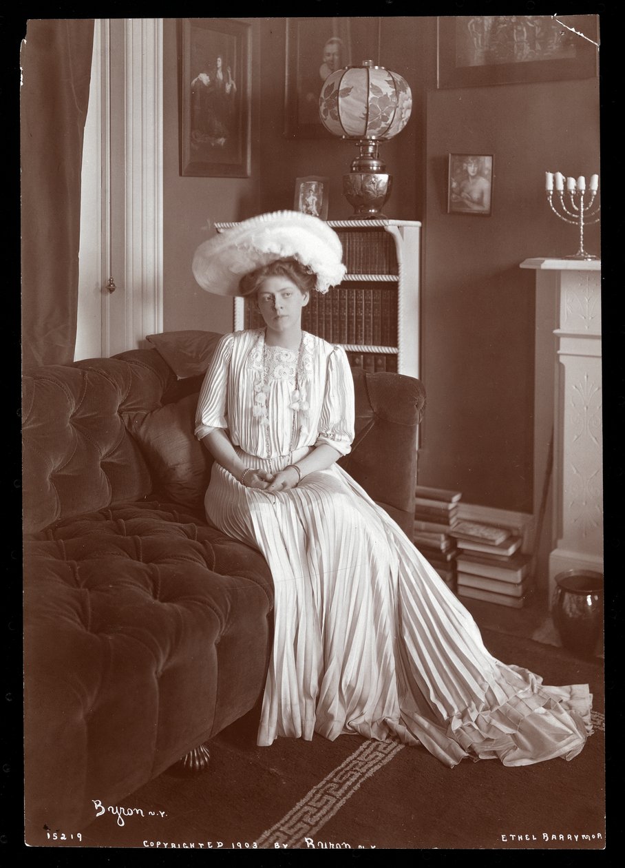 Ethel Barrymore sitting in the living room, 1902 or 1903 by Byron Company
