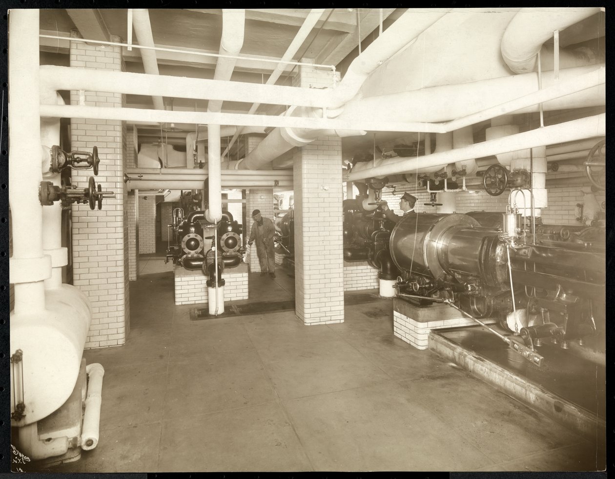 Interior view of an equipment boiler room at the New York City Bridge Dept., 1905 by Byron Company