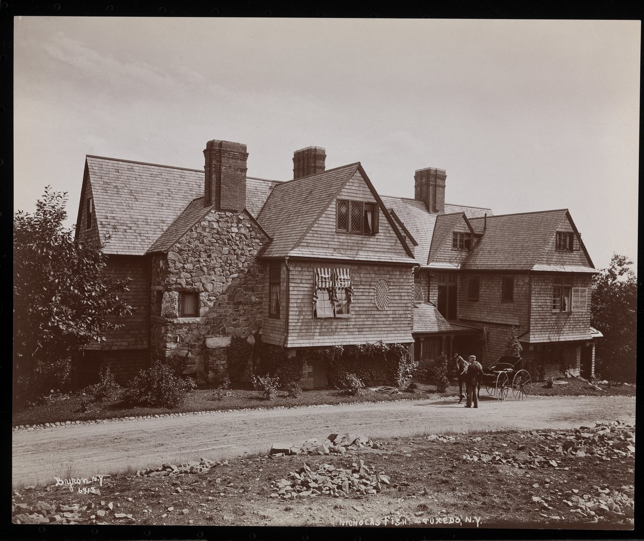 The Nicholas Fish residence and drive in Tuxedo Park, New York, 1899 by Byron Company