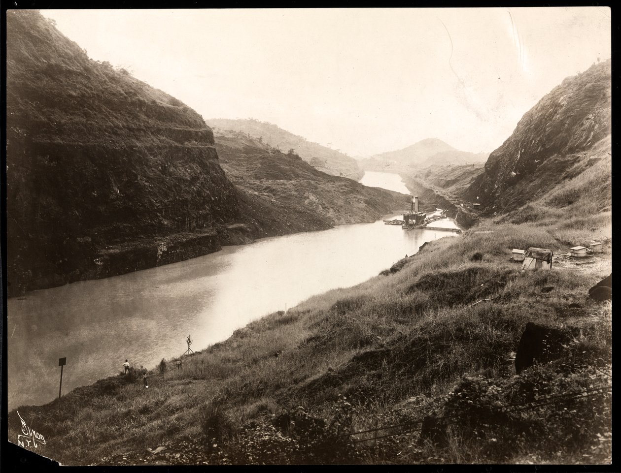 View of a freshly dug portion of the Panama Canal during construction, 1912 or 1913 by Byron Company