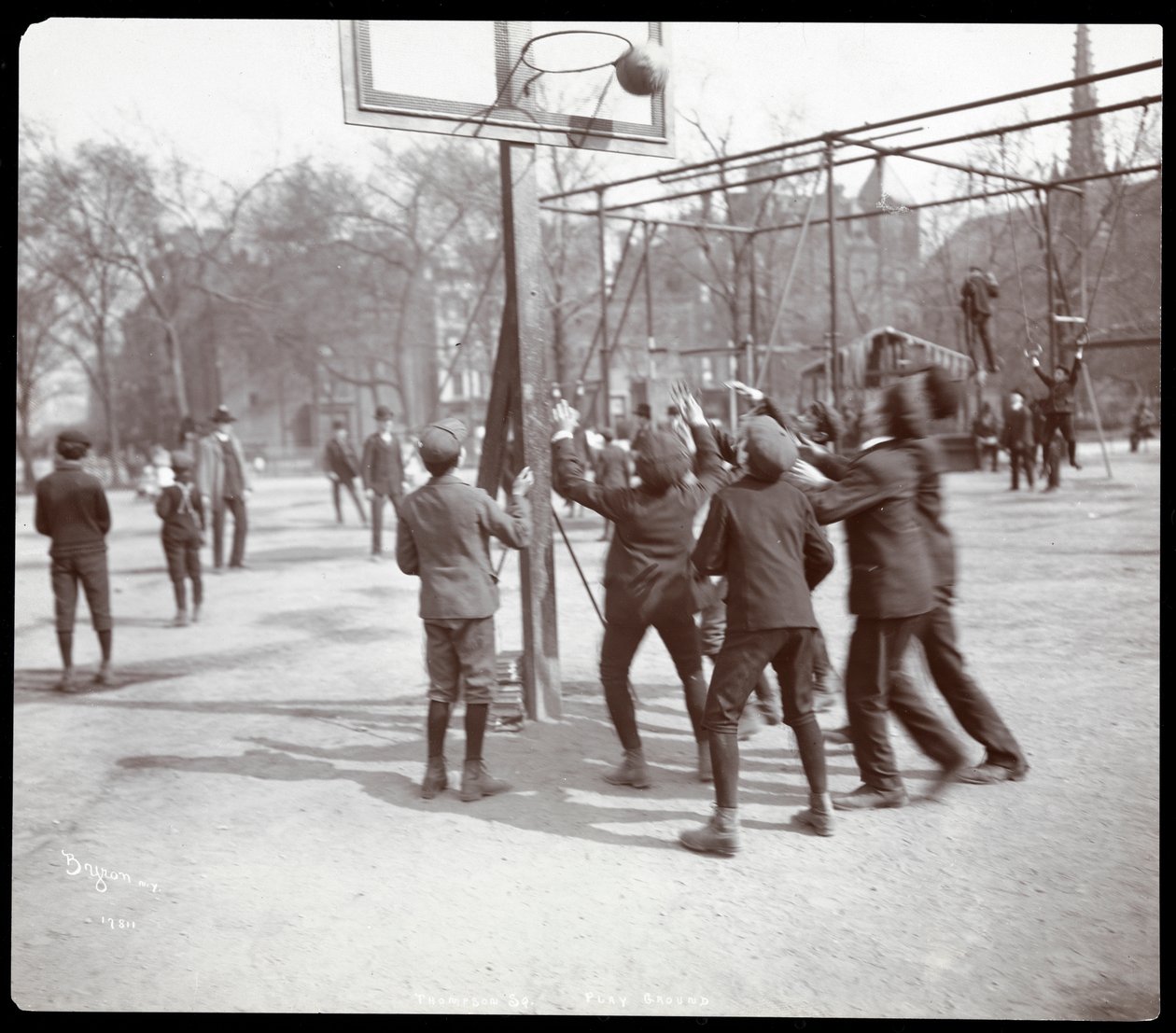 View of Boys Playing Basketball on a Court at Tompkins Square Park on Arbor Day, New York, 1904 by Byron Company