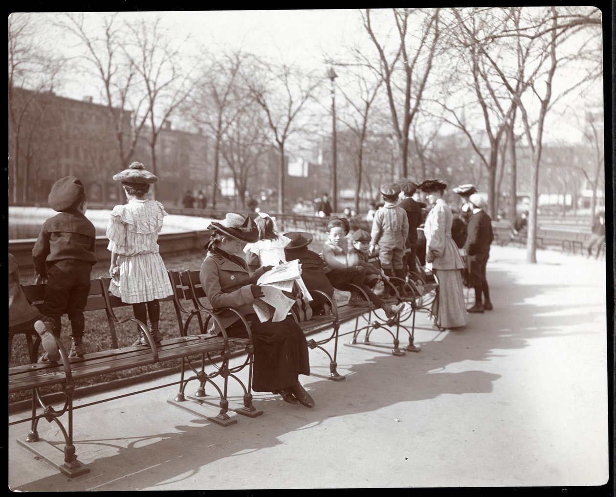Women and Children on Park Benches in Union Square, New York by Byron Company