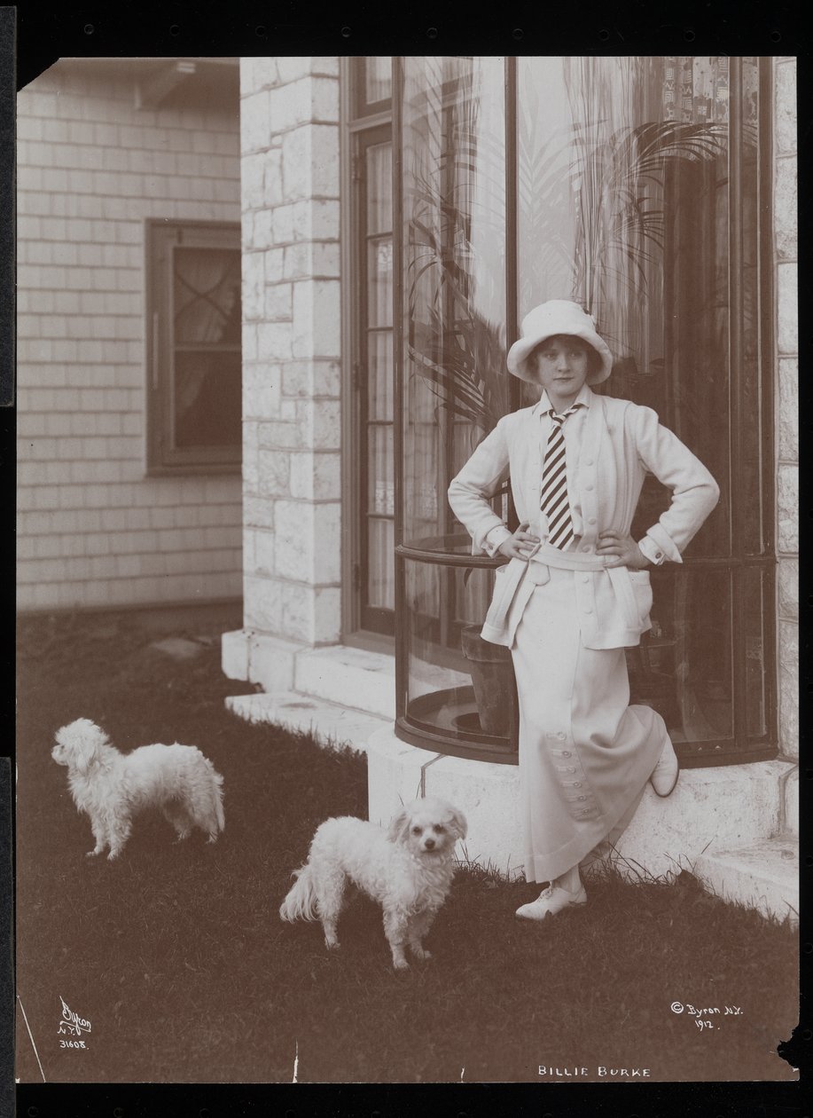 Billie Burke and two dogs at Burkeleigh Crest, her house in Hastingson, New York, 1912 by Byron Company