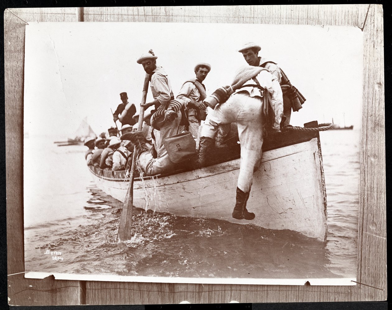 Naval Reserves at Fishers Island, New York with a Group of Sailors in a Rowing Boat, 1898 by Byron Company