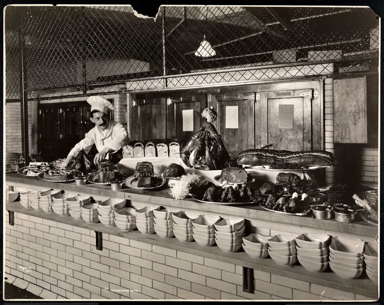 Display of cold meat in the kitchen of the Commodore Hotel, 1919 by Byron Company