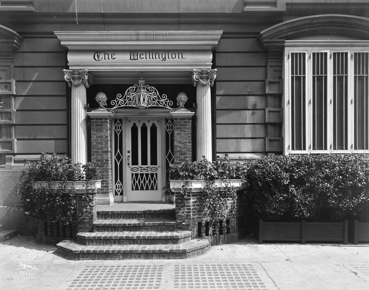Entrance to the Hotel Wellington, 871 7th Avenue, New York by Byron Company