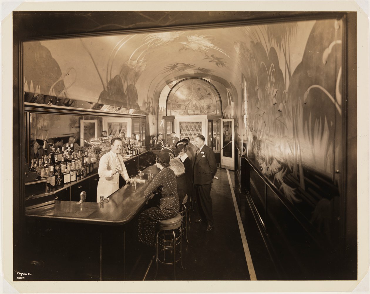 Hotel Woodward, interior, the bar, with people by Byron Company