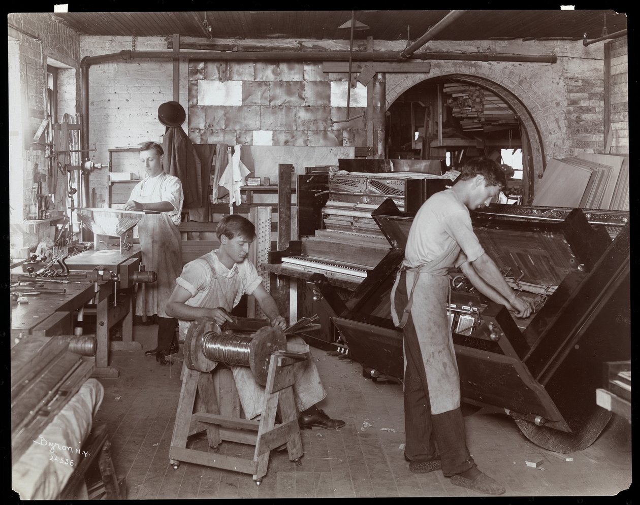 Men Working in the Hardman, Peck and Co. Piano Factory, New York, 1907 by Byron Company
