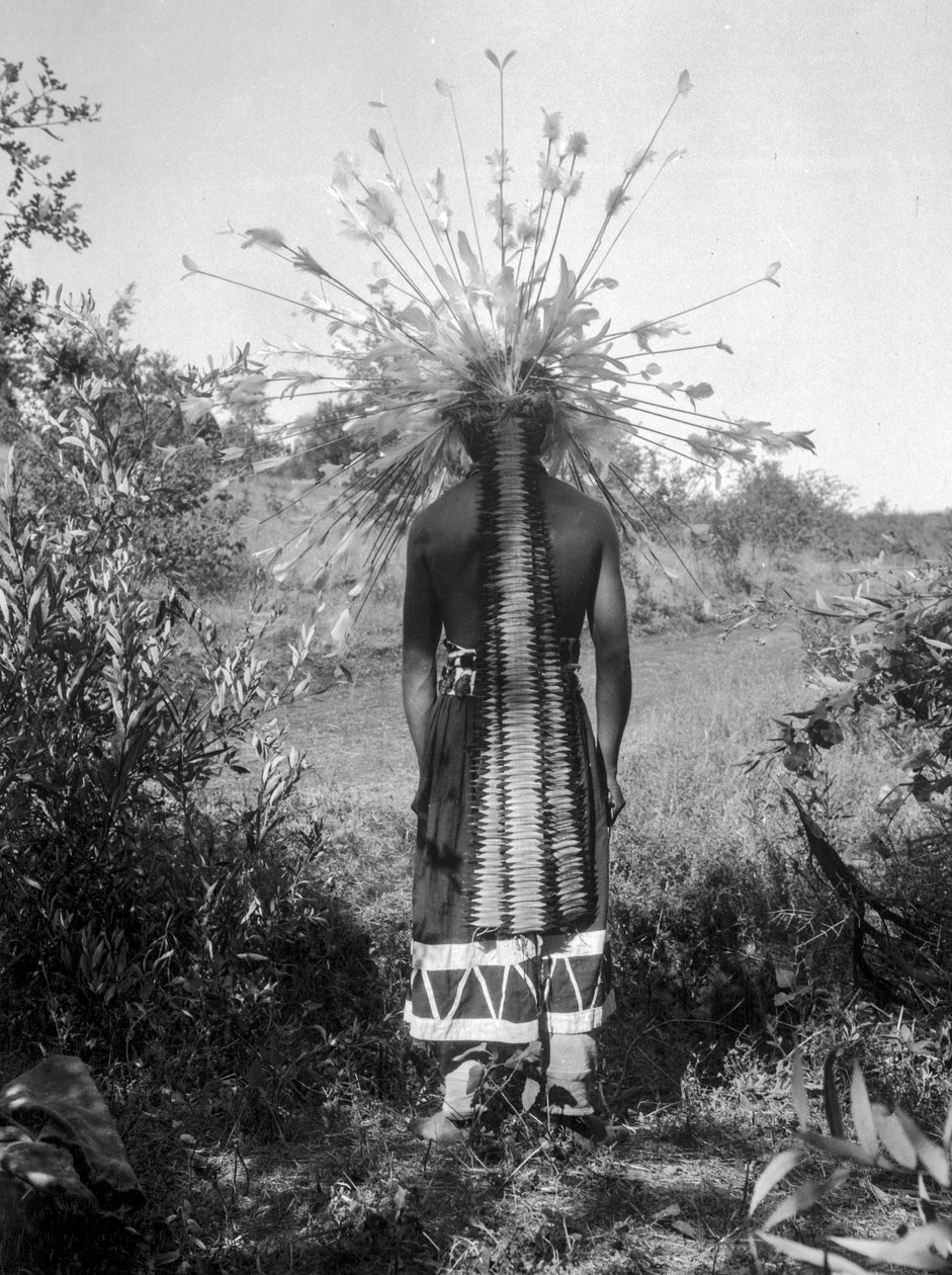 Native American people and tribal roundhouse and ceremonial attire, California by C. Hart Merriam