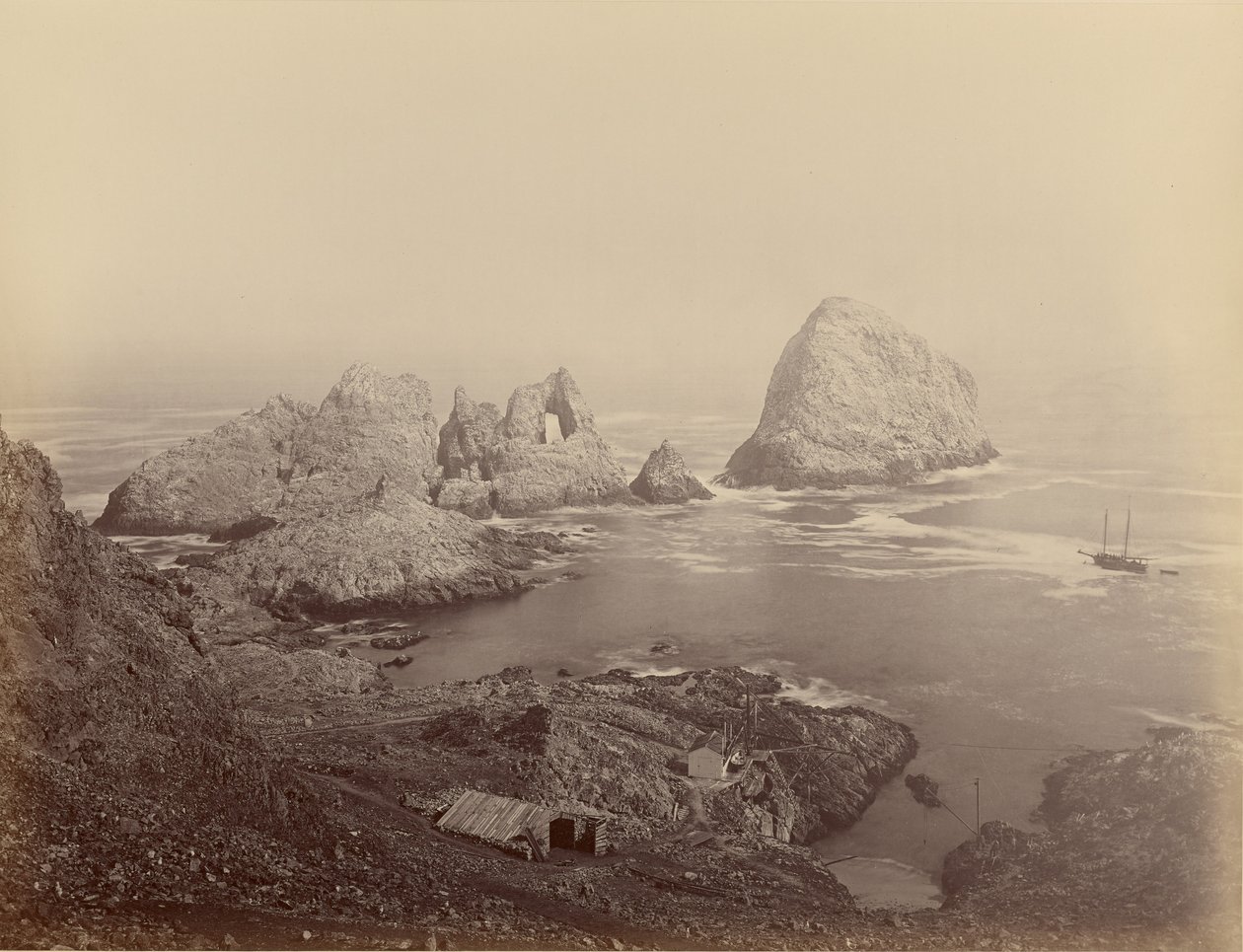 [Sugar Loaf Islands and Fisherman