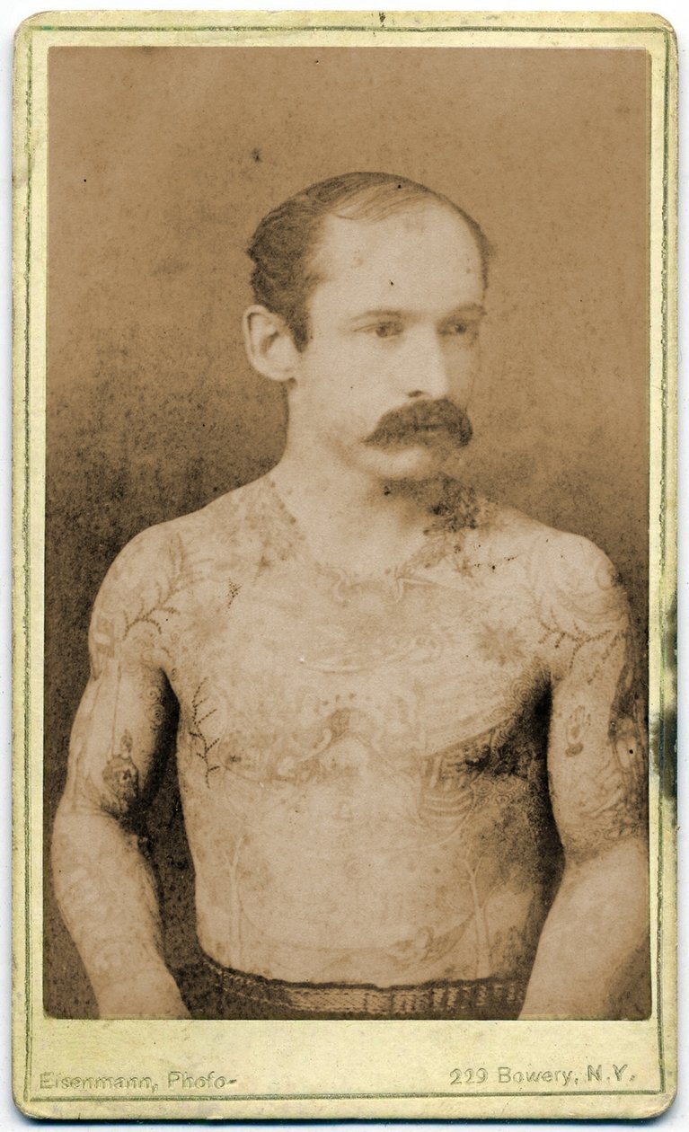 Cabinet card of a tattooed man by Charles Eisenmann