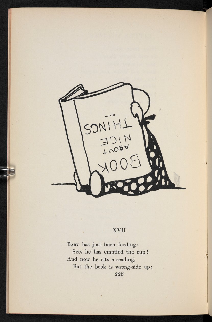 A rhyme. A child reading a book upside down by Charles Robinson
