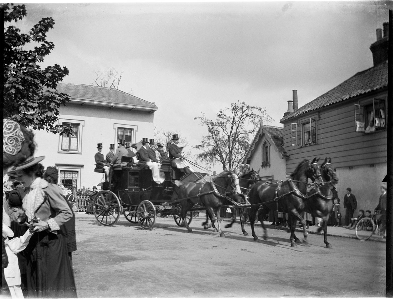 A horse-drawn coach driving past a group of cottages, Greater London Authority by Charles William Prickett