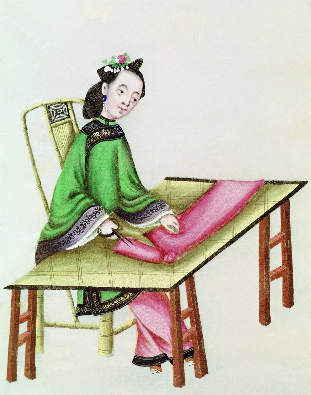 A Chinese Woman cutting cloth, Qianlong Period (1736-96) by Chinese School