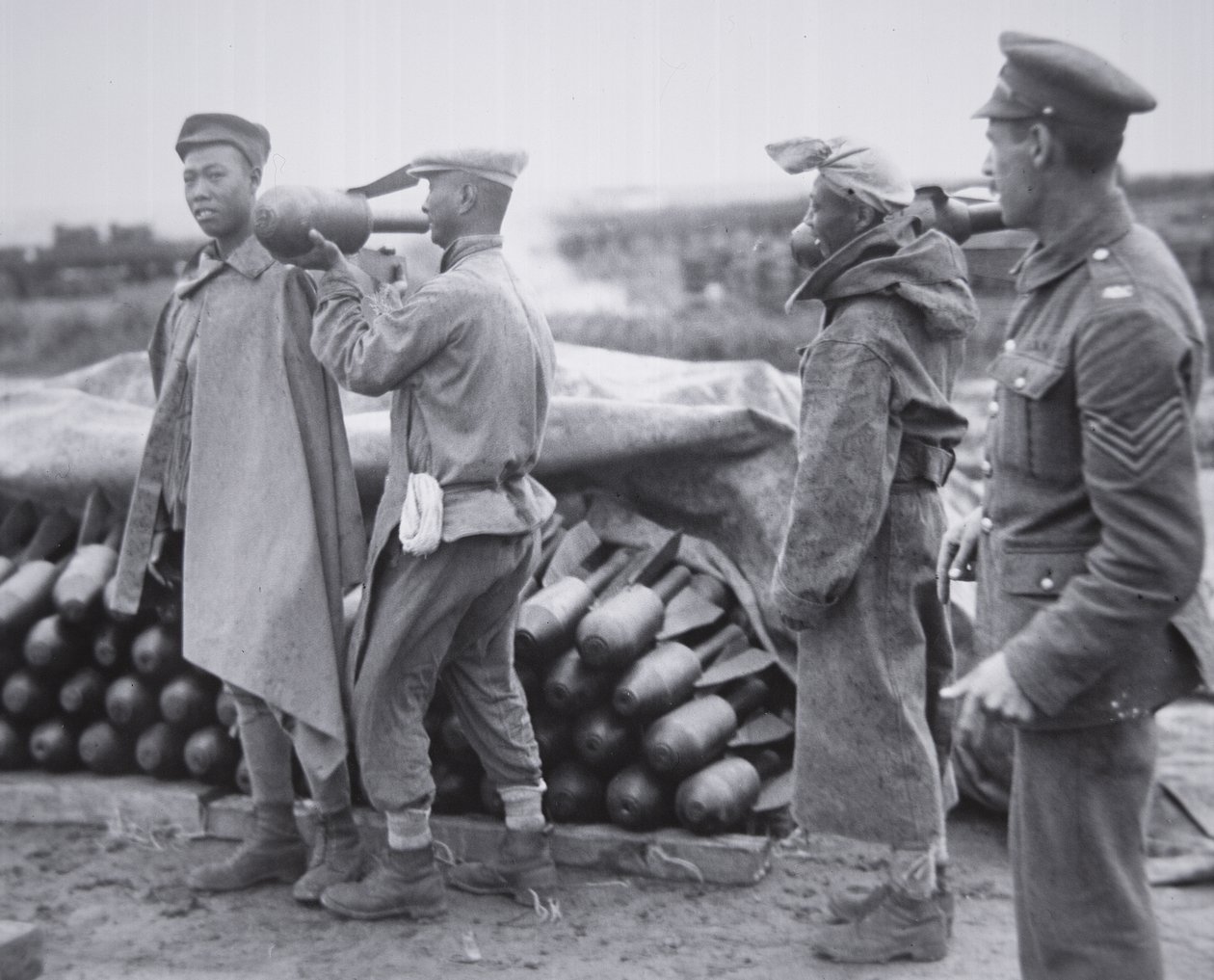 Chinese unit stocking aerial bombs at an ordnance depot in France by Chinese Photographer