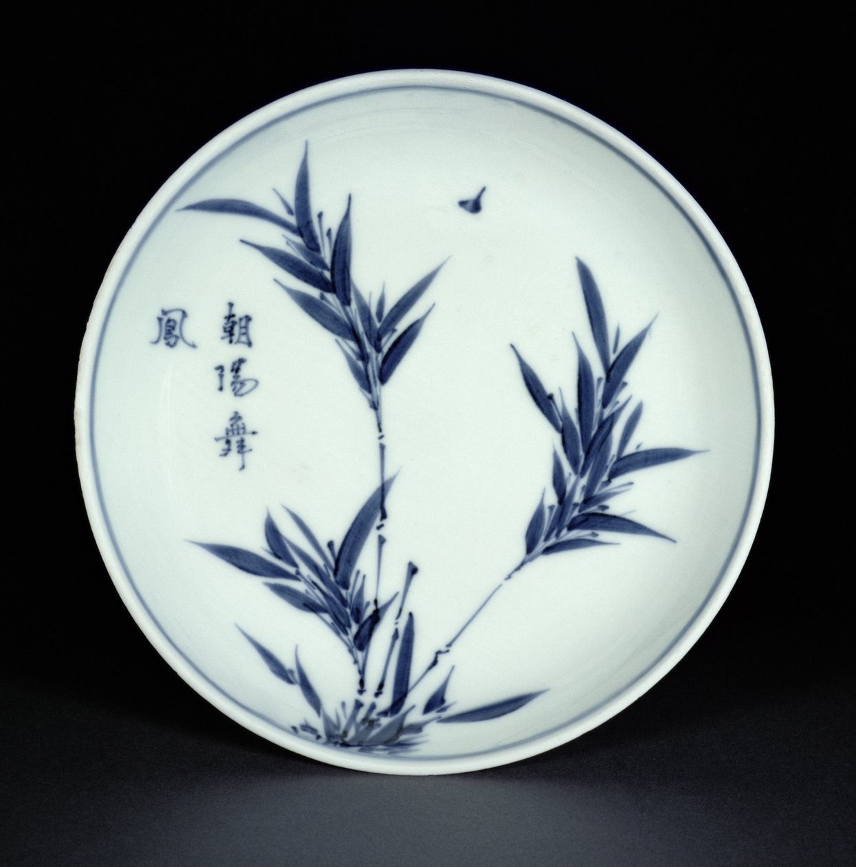Blue and white kosometsuke saucer dish painted with bamboo and calligraphy, Tianqi mark and period, 1621-27 by Chinese School