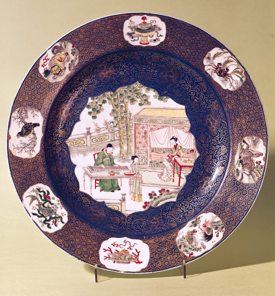 Circular dish with a musical scene, Kangxi Period by Chinese School