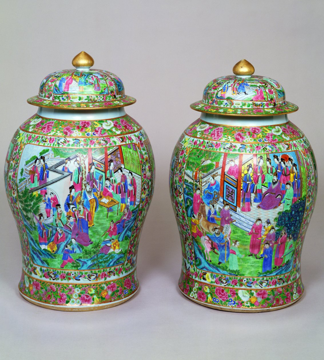 Pair of Canton famille rose baluster vases and domed covers, early 19th century by Chinese School