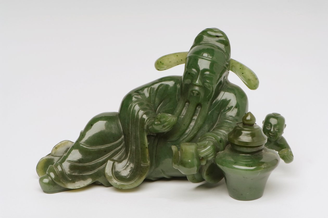 Recumbent Chinese scholar figure by Chinese School