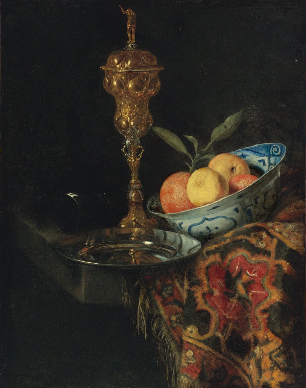 A Still Life with a Bowl of Oranges, a Pewter Plate and a Gilt Cup by Christiaen Striep