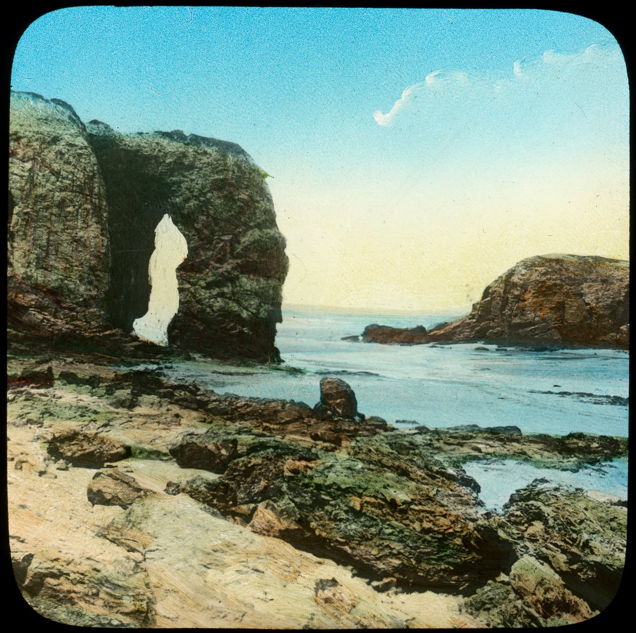 Rock arch at Perran Beach, Cornwall, late 19th or early 20th century by Church Army Lantern Department