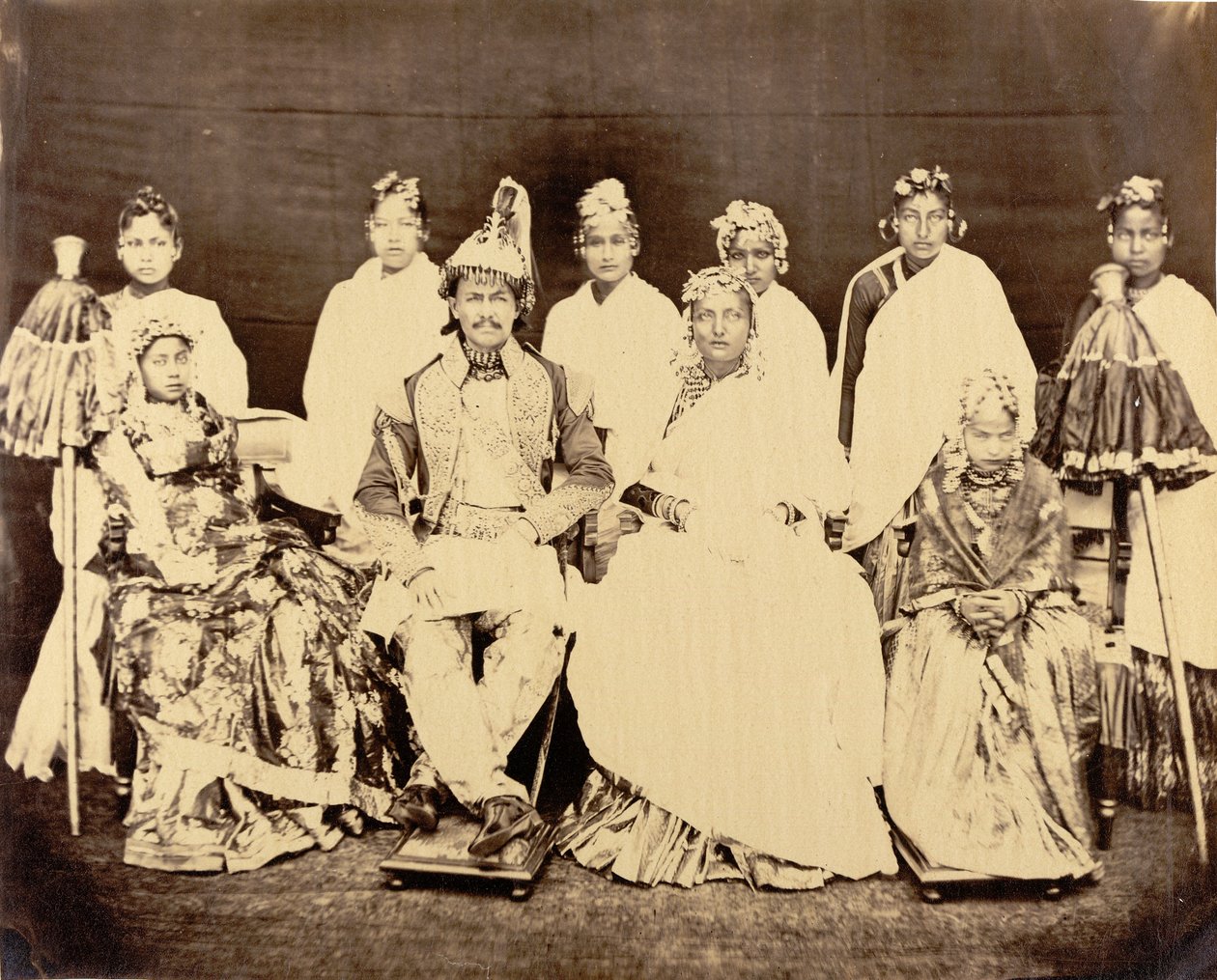 Jung Bahadoor with his principal wife, 2 daughters and slave girls by Clarence Comyn Taylor