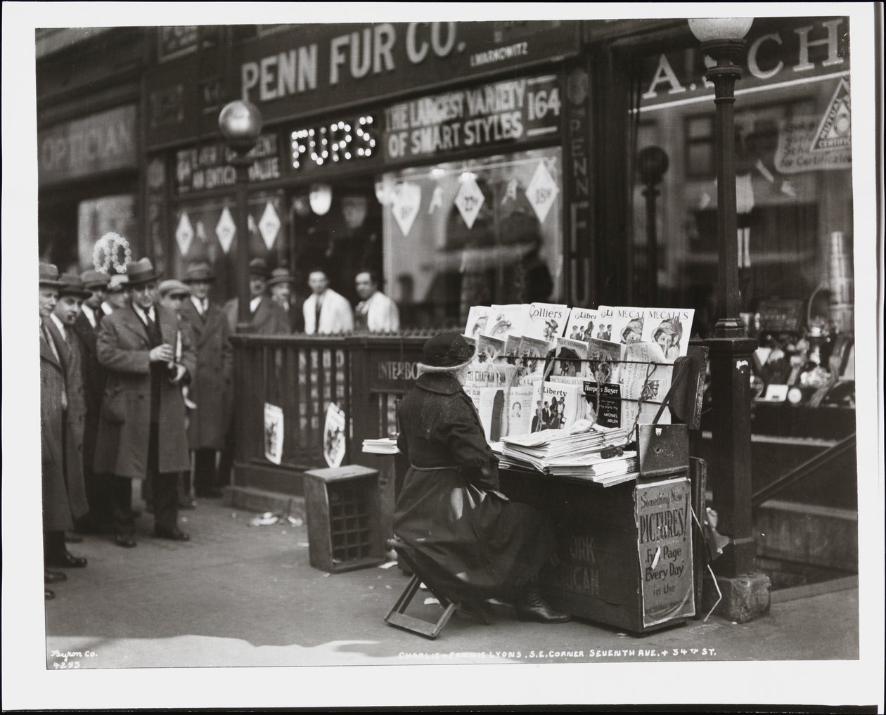 Blind news dealer, Fannie Lyons, at her stand at the south east corner of 7th Avenue & 34th Street by Company Byron
