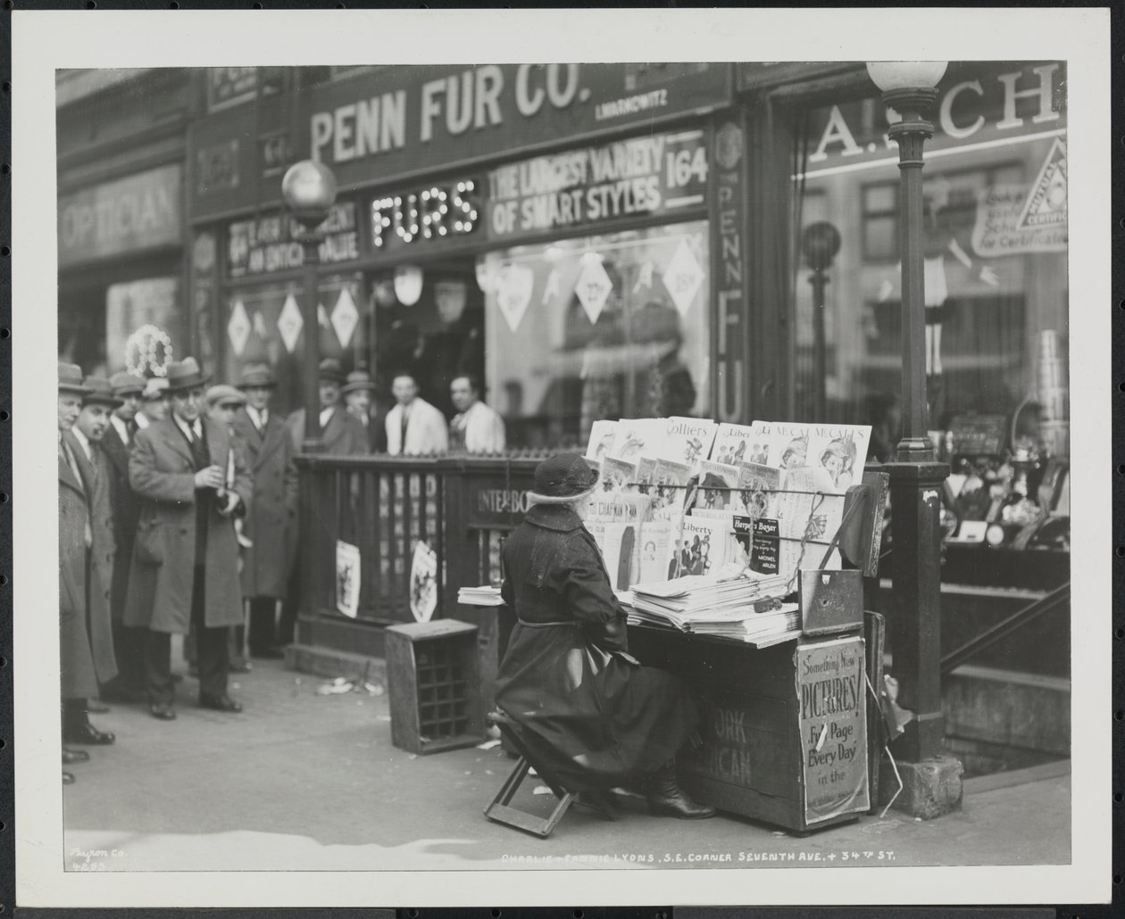 Blind news dealer, Fannie Lyons, at her stand at the southeast corner of 7th Avenue & 34th Street by Company Byron