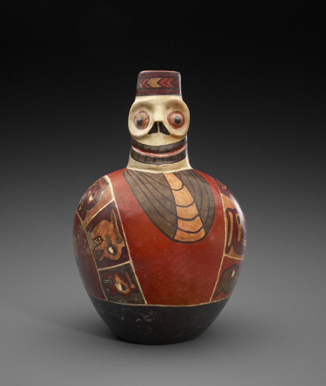 Figural Bottle with Death Mask by Culture Wari