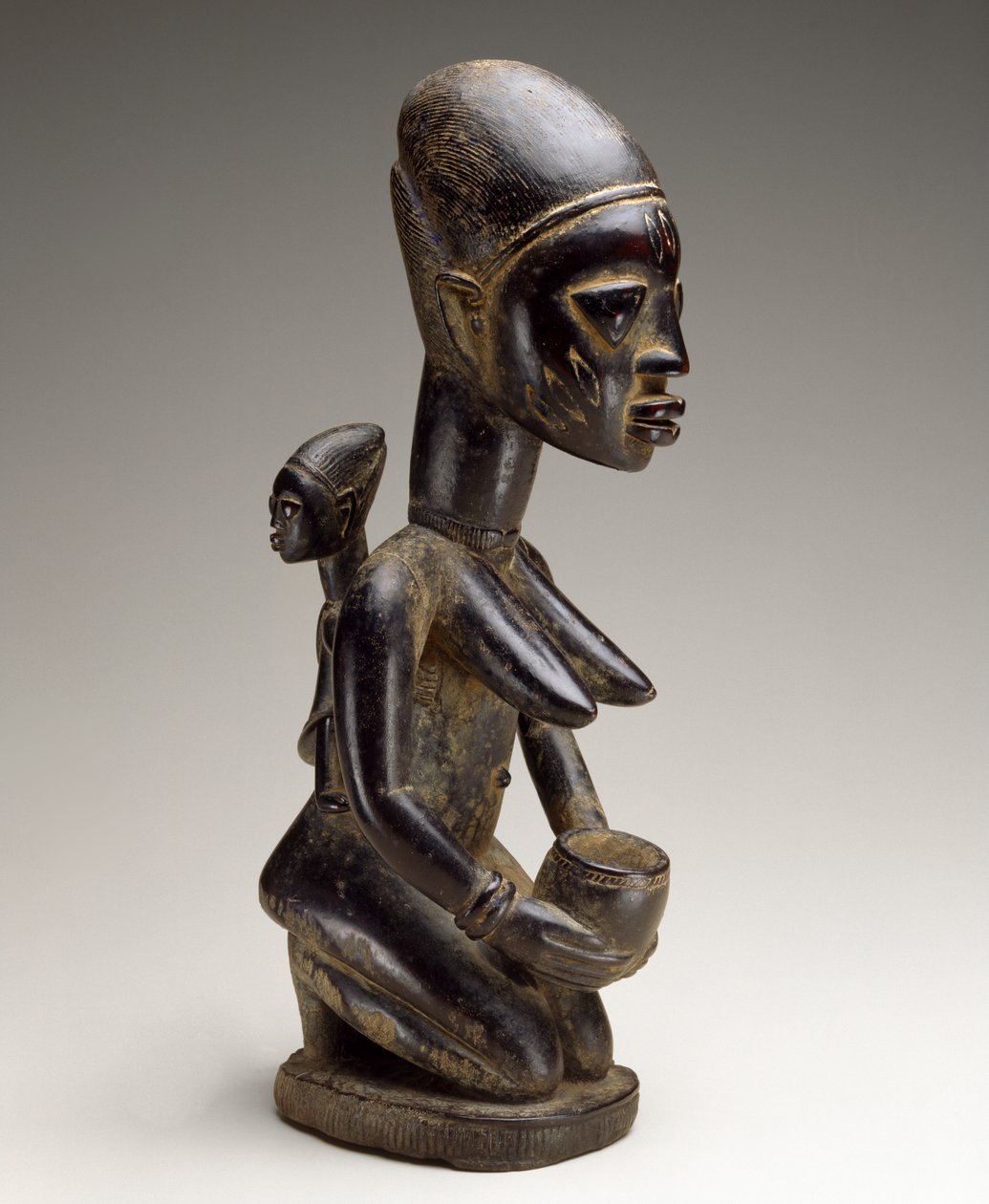 Mother and child figure, Nigeria, late 19th century by Yoruba Culture