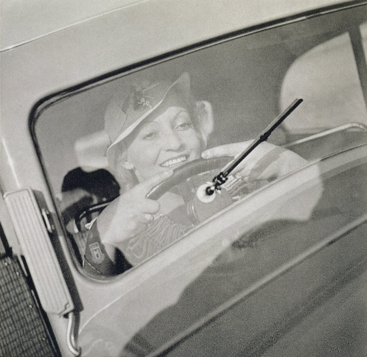 A woman driving, c.1930s by Czech Photographer