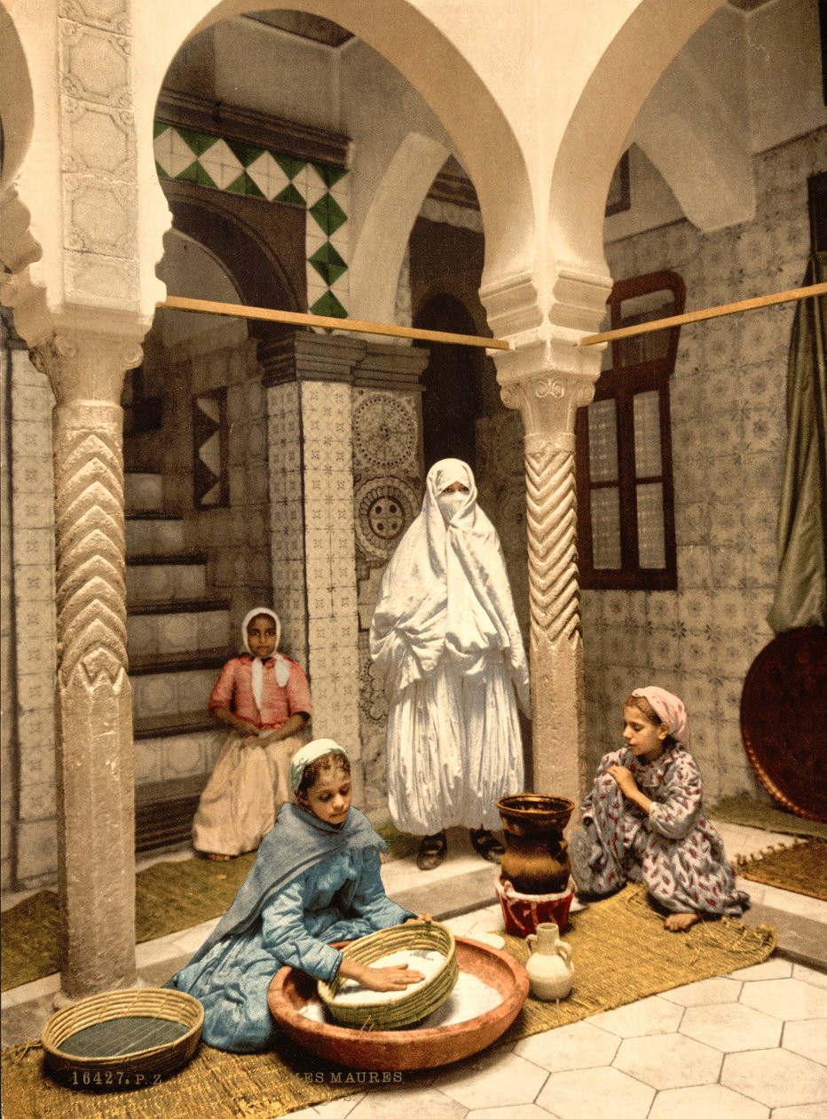 Moorish Women Preparing Couscous in a Courtyard, Algiers, Algeria, c.1899 by Detroit Photographic Co.
