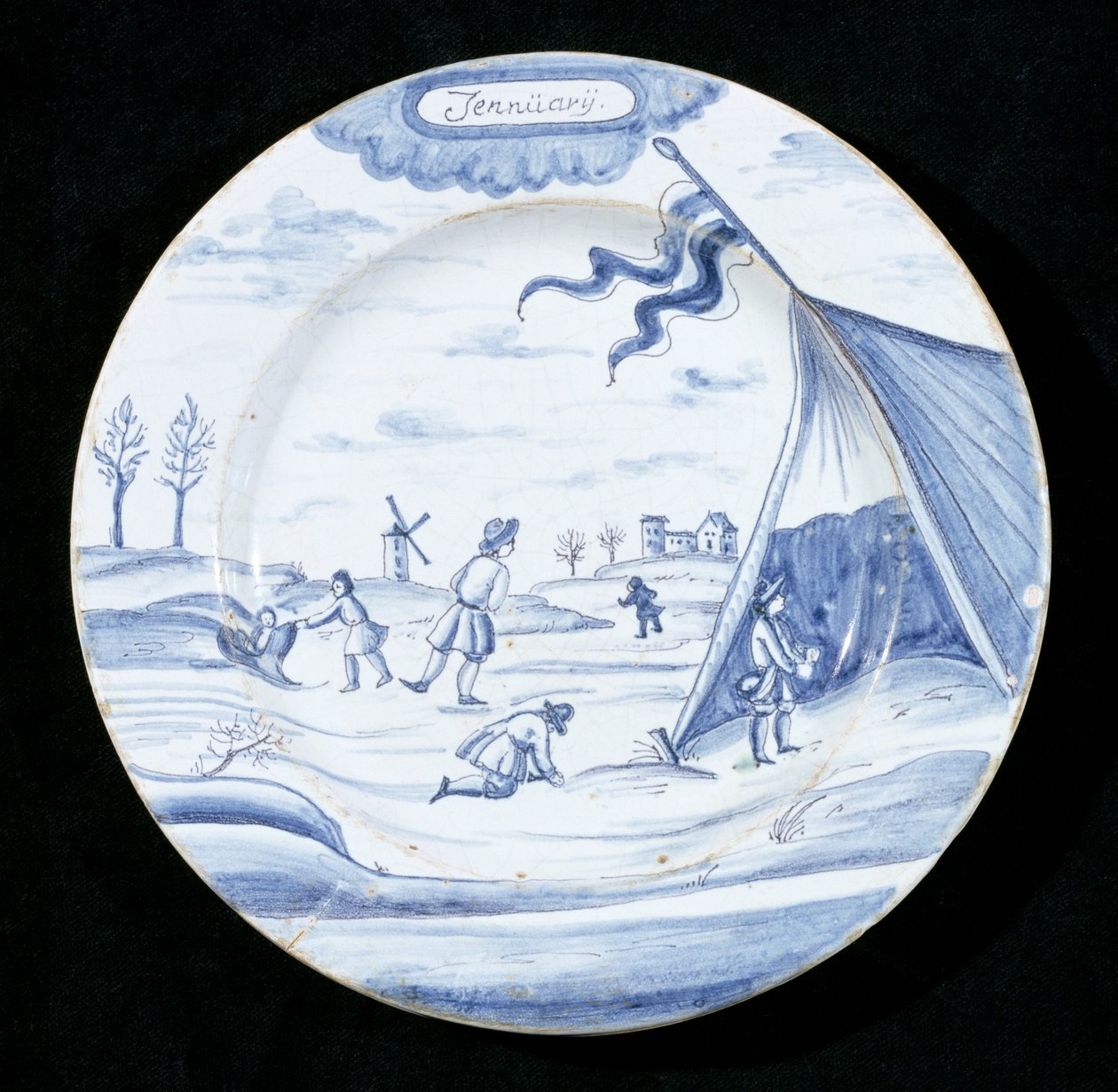 Delftware plate depicting the month of January by Dutch School