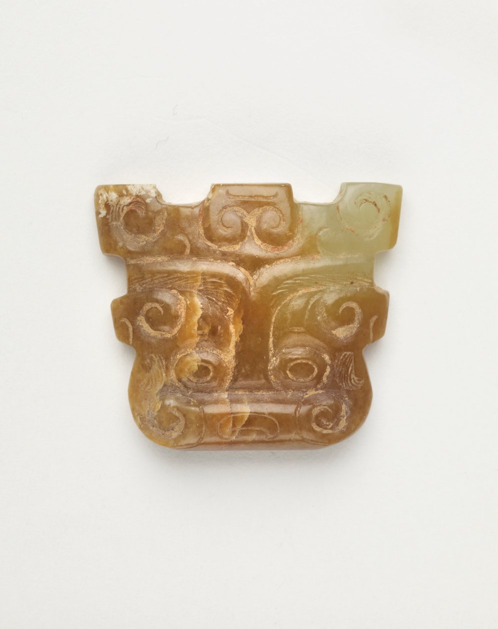 Animal mask-shaped pendant by Eastern Zhou Dynasty Chinese School